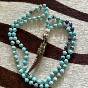 Mollymoo jewels long horn pendant necklace with genuine stones. Never worn.